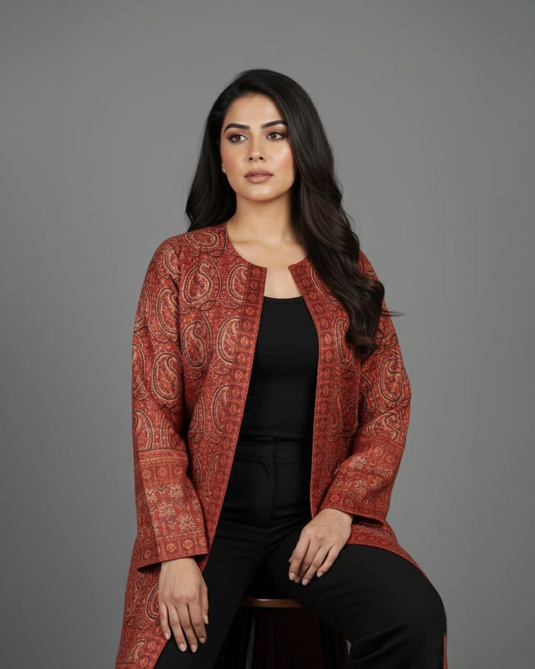 Paisley motif close‑up on long jacket